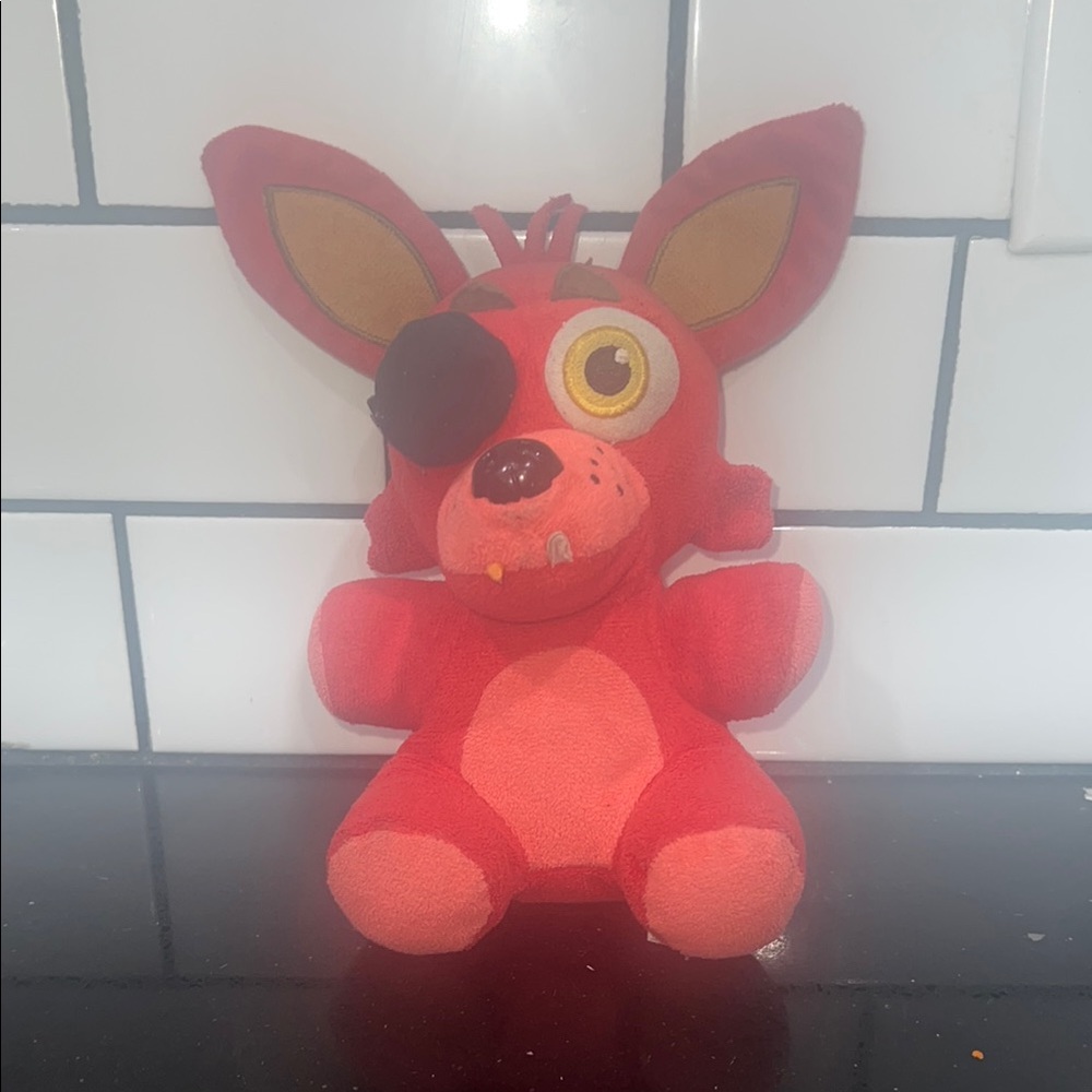 Red Plush Toy with Eye Patch